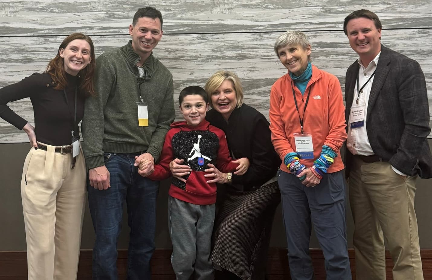 Left to right: Kendall Robbins, Matthew Sims, Charlie, Sharon King, Dr. Elizabeth Berry-Kravis, Dr. Steven Gray