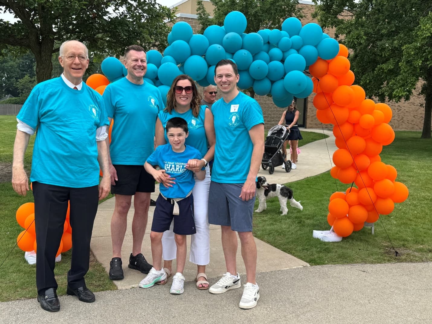 Congressman Bill Foster, Mayor Scott Wehrli, Charlie, Leigh, and Matthew Sims at Walk with Charlie 2026